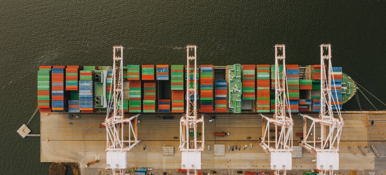 containers being put on the ship 