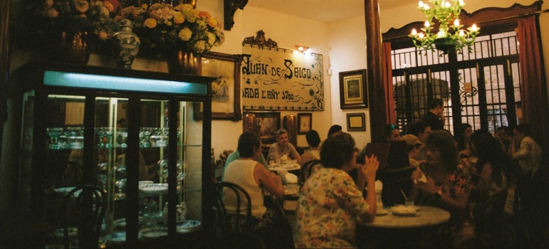 people dining out after moving from USA to Spain