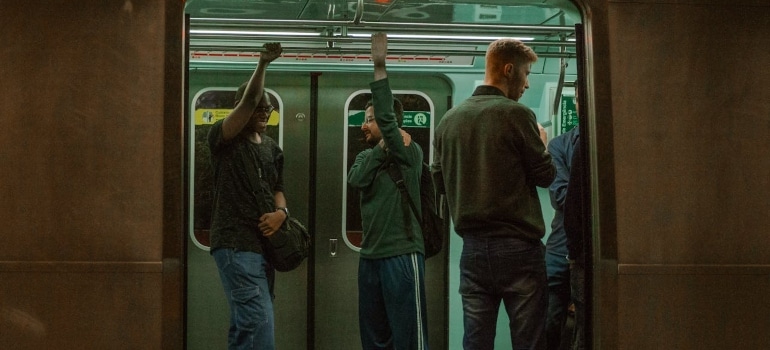 people in the subway are thinking about moving to the UK