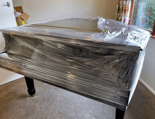 international moving companies near me can help pack and move a piano safely