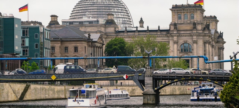 a photo of a German bridge and vehicles on it