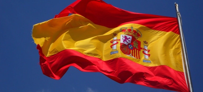 Spanish flag, couples to tackle together after moving abroad