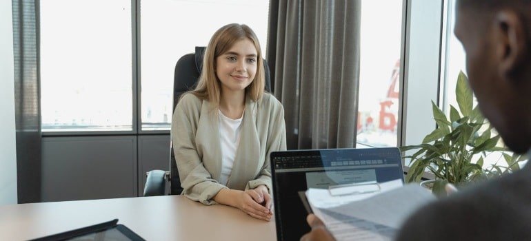 a person in an interview for a visa